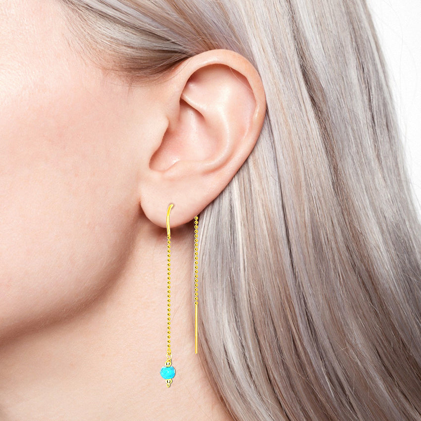Trendy lariat earring 14k yellow gold with turquoise.